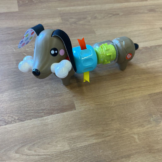 Fisher Price Sausage Dog Twist Toy