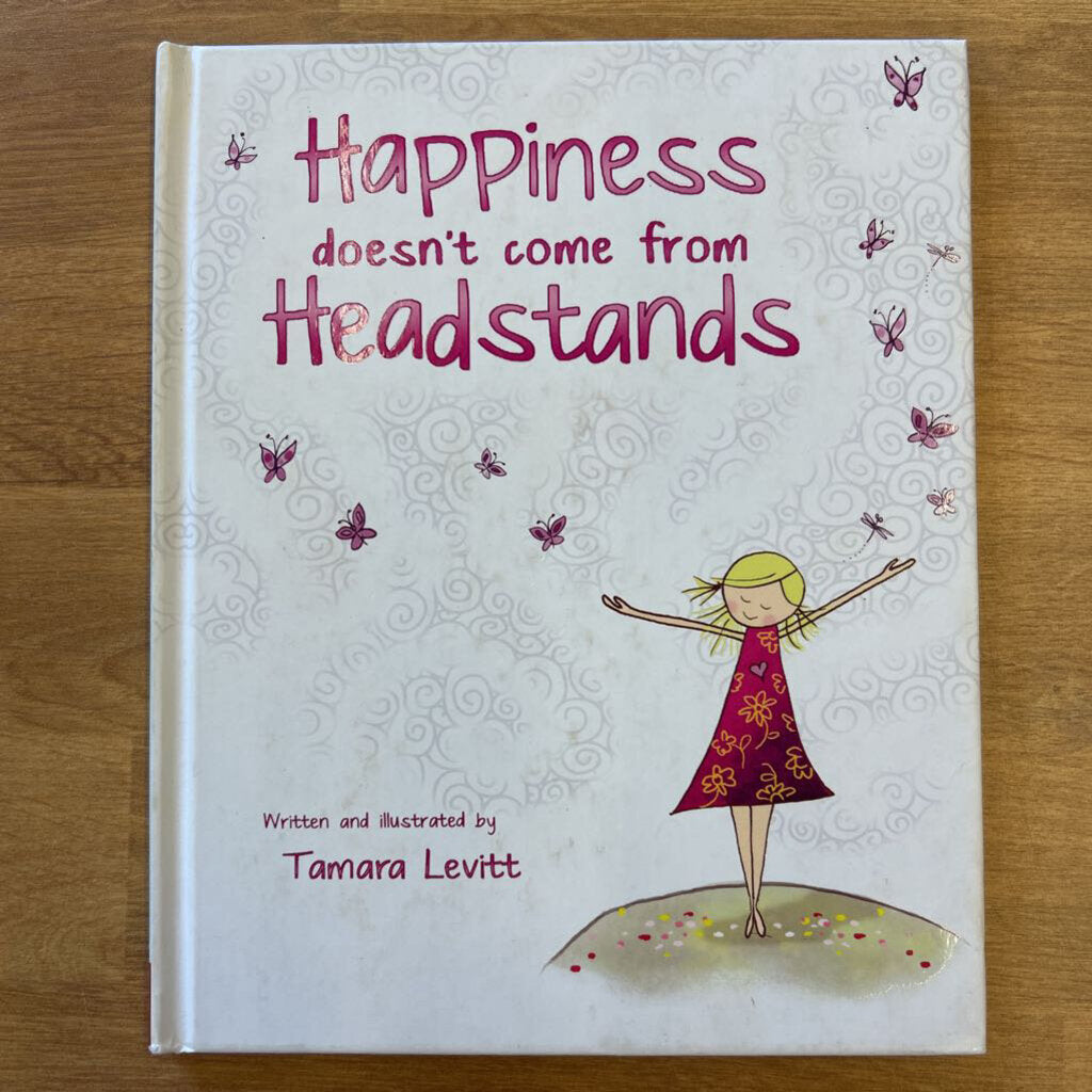 Happiness doesn't come from Headstands