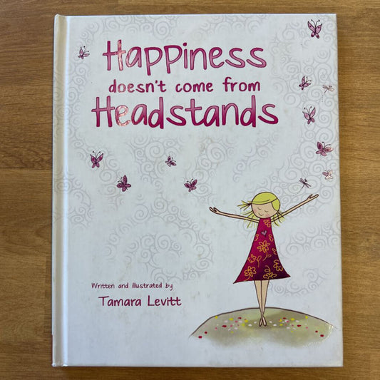 Happiness doesn't come from Headstands